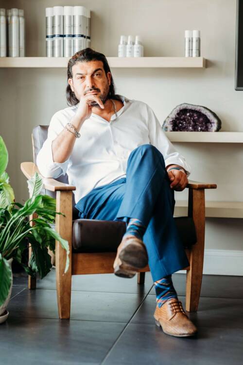 Tomy B. Salon CEO Tomy b siting