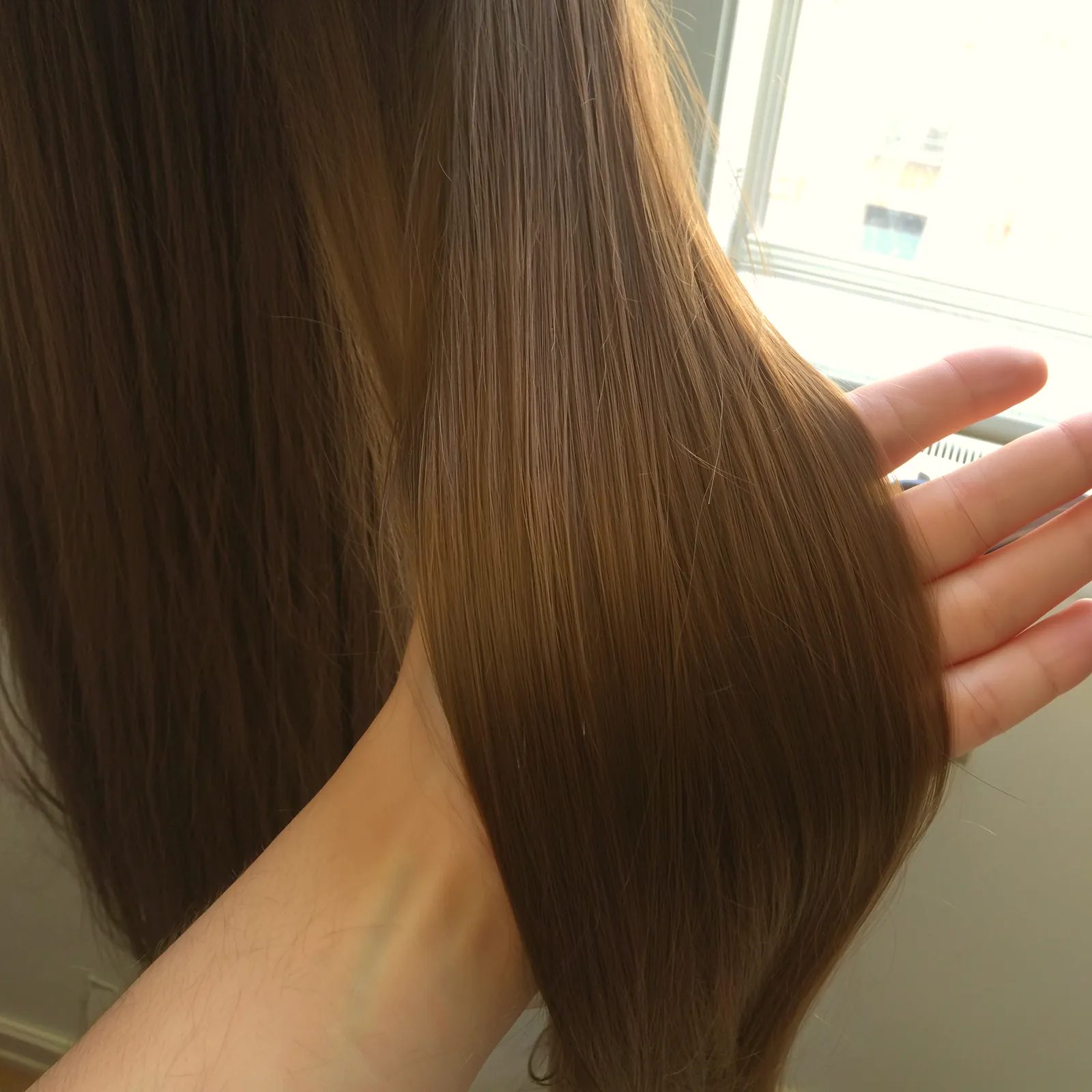 Hair after the collagen treatment at Tomy B. Salon